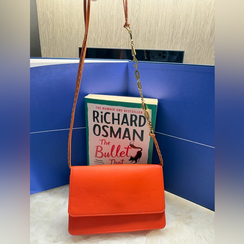 Jacquemus Orange Leather Crossbody with Gold Chain Accent